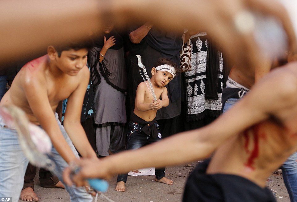 Sharp: Even very small children swing the sharp blades on the end of chains, slashing their skin in the brutal ritual