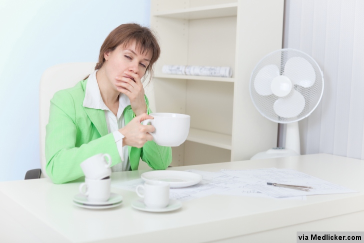 Tired student and table fan