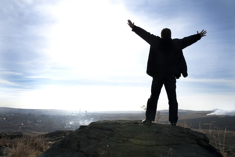 Silhouette of man on mountain