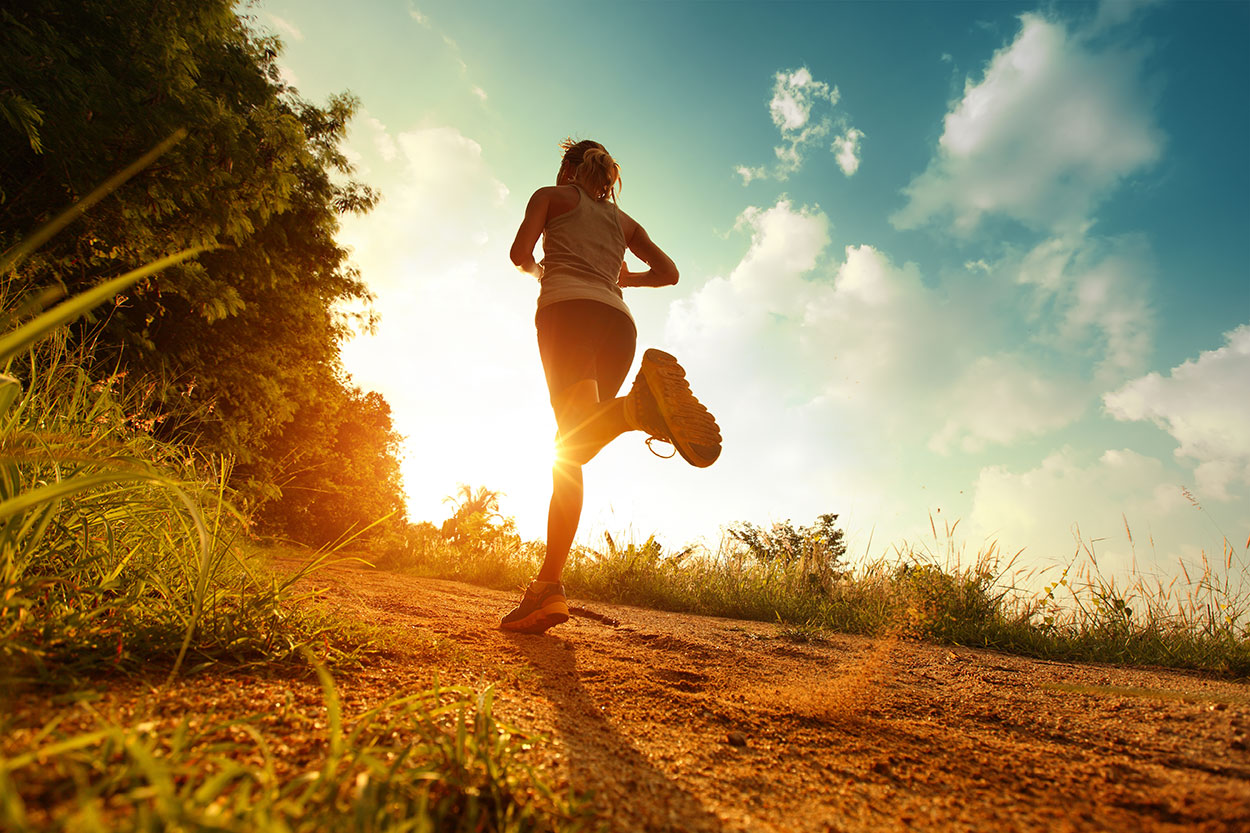 Woman running on a path.